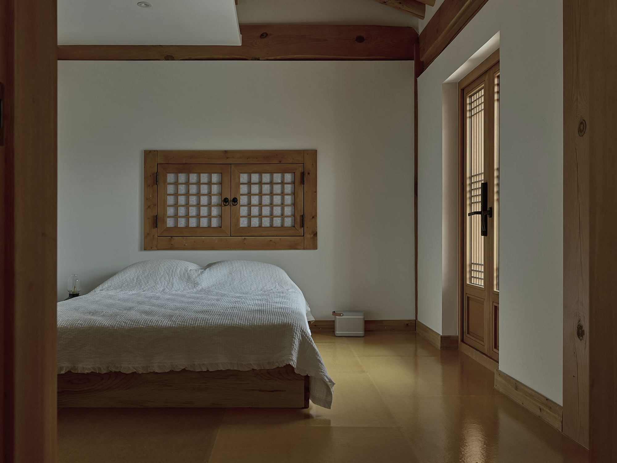 The bedroom under the rafters, seen from the doorway